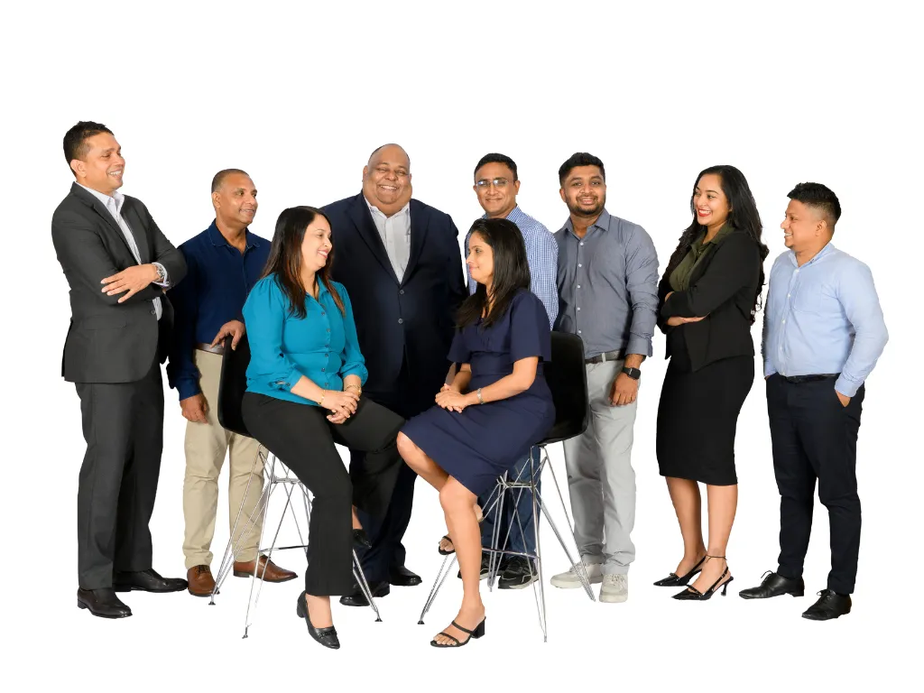 Diverse professionals posing in business attire.