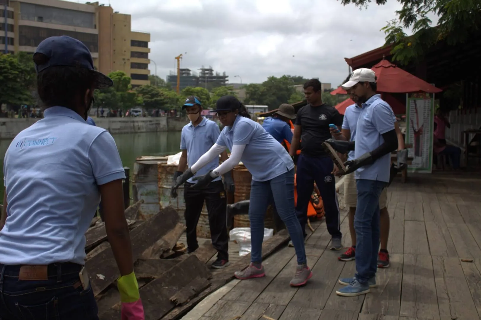 A group of people cleaning a waterway.